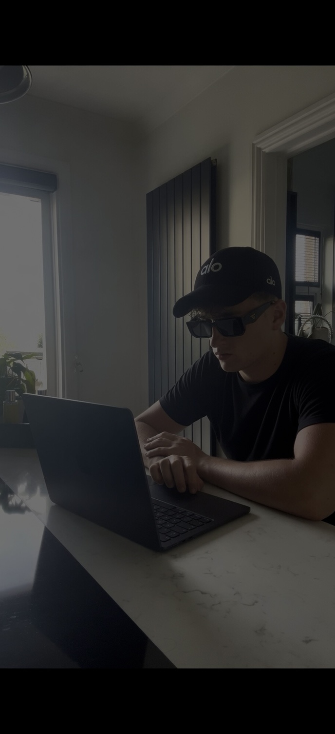 Louis working on a laptop